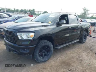 2021 Ram 1500 Big Horn with VIN 1C6SRFFT4MN818902, listed as a IAAI auction lot 42581851 with 58,615 mi miles and . Bid and sale history available at DreamBid. Image 2.