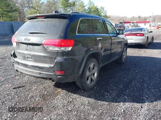 2014 Jeep Grand Cherokee Limited with VIN 1C4RJFBG3EC153236, listed as a IAAI auction lot 41858900 with 151,361 mi miles and . Bid and sale history available at DreamBid. Image 4.