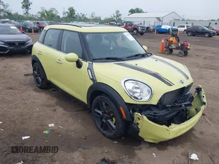 2012 MINI Countryman S z VIN WMWZC3C59CWL82955, wystawiony jako IAAI lot #42237702 z przebiegiem 61 903 mil mil oraz . Historia ofert i sprzedaży dostępna na DreamBid. Obrazek 1.