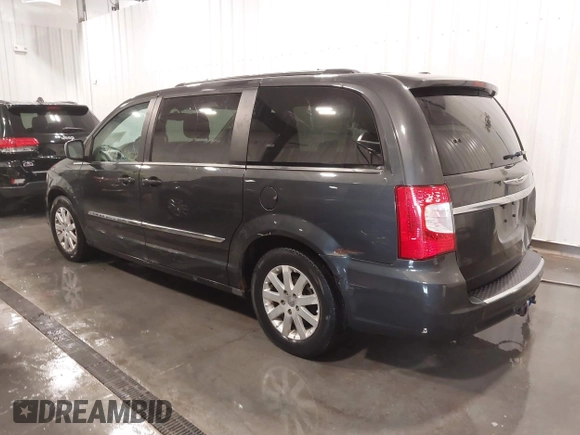 2011 Chrysler Town & Country Touring L with VIN 2A4RR8DG3BR676240, listed as a IAAI auction lot 41980939 with 184,524 mi miles and . Bid and sale history available at DreamBid. Image 3.