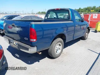 2000 Ford F-150 XL with VIN 3FTZF1722YMA80722, listed as a IAAI auction lot 40449042 with 205,576 mi miles and . Bid and sale history available at DreamBid. Image 4.