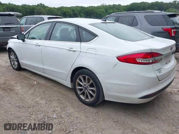 2017 Ford Fusion SE z VIN 3FA6P0H71HR413635, wystawiony jako IAAI lot #42507386 z przebiegiem 165 991 mil mil oraz . Historia ofert i sprzedaży dostępna na DreamBid. Obrazek 3.
