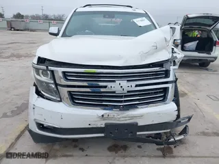 2019 Chevrolet Tahoe Premier with VIN 1GNSCCKJ4KR169077, listed as a IAAI auction lot 41548001 with 89,397 mi miles. Bid and sale history available at carsss.com. Image 12.
