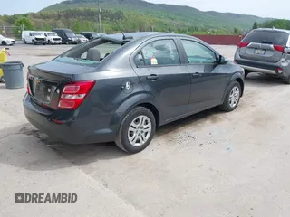 2017 Chevrolet Sonic LS z VIN 1G1JB5SG3H4135041, wystawiony jako IAAI lot #42168751 z przebiegiem 91 312 mil mil oraz . Historia ofert i sprzedaży dostępna na DreamBid. Obrazek 4.