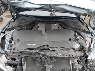 2015 Infiniti Q50 Premium with VIN JN1BV7AP1FM351633, listed as a IAAI auction lot 41880366 with 106,564 mi miles. Bid and sale history available at carsss.com. Image 10.