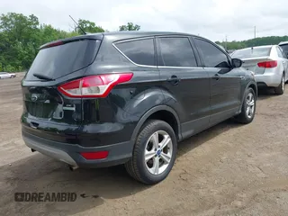 2013 Ford Escape SE with VIN 1FMCU0GX4DUC40277, listed as a IAAI auction lot 42201196 with 46,157 mi miles and . Bid and sale history available at carsss.com. Image 4.
