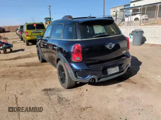 2012 MINI Countryman S with VIN WMWZC5C50CWL63321, listed as a Copart auction lot 52427065 with 126,898 mi miles and Salvage Title. Bid and sale history available at DreamBid. Image 13.