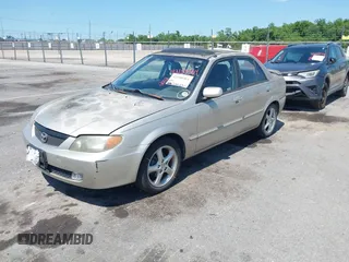 2002 Mazda Protege DX with VIN JM1BJ225820568350, listed as a IAAI auction lot 42188364 with 52,572 mi miles and . Bid and sale history available at DreamBid. Image 2.