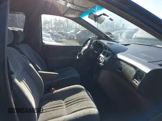 2001 Toyota Sienna LE z VIN 4T3ZF13C51U324527, wystawiony jako IAAI lot #41622465 z przebiegiem 145 450 mil mil oraz . Historia ofert i sprzedaży dostępna na DreamBid. Obrazek 5.