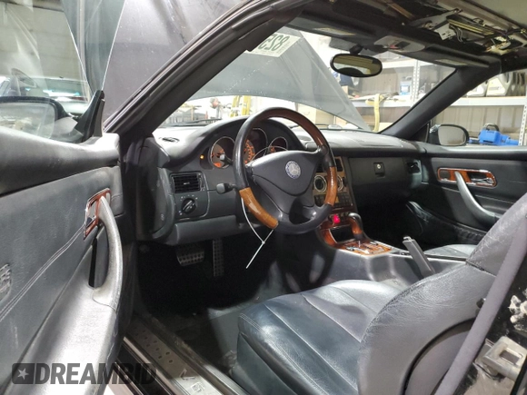 2003 Mercedes-Benz SLK 320 with VIN WDBKK65F23F277574, listed as a Copart auction lot 82523004 with 112,143 mi miles and Clean title. Bid and sale history available at DreamBid. Image 8.