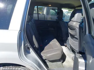 2004 Honda Pilot EX with VIN 2HKYF18514H592640, listed as a IAAI auction lot 41898618 with 230,866 mi miles. Bid and sale history available at carsss.com. Image 8.
