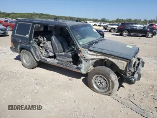 1995 Jeep Cherokee with VIN 1J4FN78S5SL557086, listed as a Copart auction lot 74221184 with 416,415 mi miles and Salvage title. Bid and sale history available at DreamBid. Image 4.