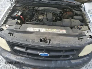 1997 Ford F-150 z VIN 1FTDF1727VNC35289, wystawiony jako Copart lot #54521915 z przebiegiem 148 171 mil mil oraz Szkoda całkowita • Salvage title. Historia ofert i sprzedaży dostępna na DreamBid. Obrazek 11.