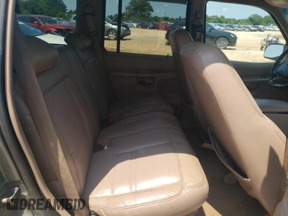 1999 Ford Explorer XLT z VIN 1FMZU32E4XUB76005, wystawiony jako Copart lot #65391564 z przebiegiem 245 873 mil mil oraz Szkoda całkowita • Salvage title. Historia ofert i sprzedaży dostępna na DreamBid. Obrazek 11.