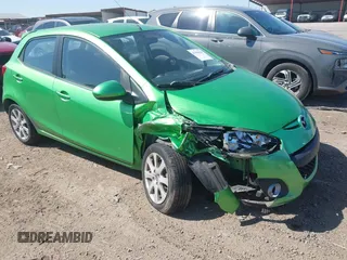 2013 Mazda 2 Touring z VIN JM1DE1LY1D0155883, wystawiony jako IAAI lot #41990258 z przebiegiem 108 766 mil mil oraz . Historia ofert i sprzedaży dostępna na DreamBid. Obrazek 1.