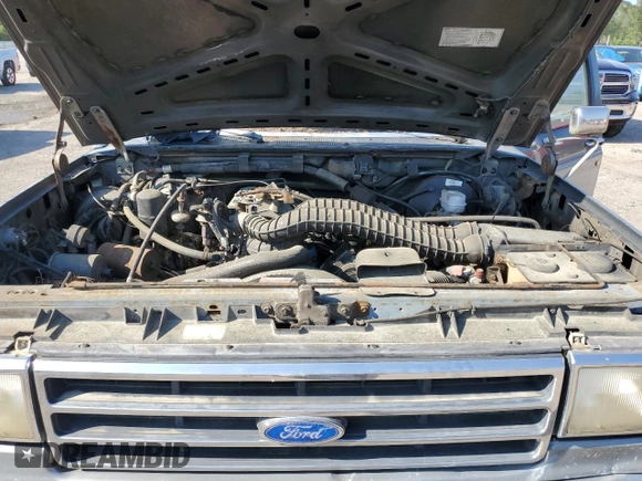 1990 Ford F-150 with VIN 1FTEX15NXLKA72702, listed as a Copart auction lot 52421535 with 720,181 mi miles and Clean Title. Bid and sale history available at carsss.com. Image 11.