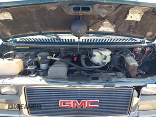 1994 GMC Vandura z VIN 1GDEG25K4RF523356, wystawiony jako IAAI lot #41854612 z przebiegiem 187 013 mil mil oraz . Historia ofert i sprzedaży dostępna na DreamBid. Obrazek 10.