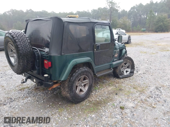 2000 Jeep Wrangler Sahara with VIN 1J4FA59SXYP701098, listed as a IAAI auction lot 41592872 with 1 mi miles. Bid and sale history available at carsss.com. Image 4.