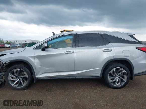 2018 Lexus RX 450hL Premium with VIN JTJDGKCA6J2003954, listed as a IAAI auction lot 42259774 with 93,706 mi miles and . Bid and sale history available at DreamBid. Image 14.