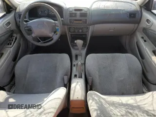 2000 Toyota Corolla VE with VIN 1NXBR12E5YZ387383, listed as a Copart auction lot 78931374 with 162,008 mi miles and Salvage title. Bid and sale history available at DreamBid. Image 8.