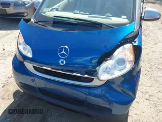 2009 Smart fortwo Pure with VIN WMEEJ31X79K210162, listed as a IAAI auction lot 42715203 with 95,089 mi miles and . Bid and sale history available at DreamBid. Image 6.