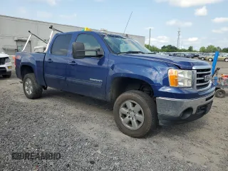 2013 GMC Sierra 1500 SLT with VIN 3GTP2WE70DG378533, listed as a Copart auction lot 59716065 with 233,607 mi miles and Salvage title. Bid and sale history available at DreamBid. Image 4.