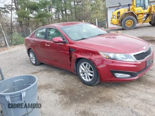 2013 Kia Optima LX with VIN 5XXGM4A75DG112495, listed as a IAAI auction lot 42059578 with 70,115 mi miles. Bid and sale history available at carsss.com. Image 1.