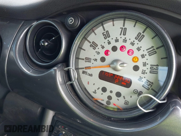 2006 MINI Convertible with VIN WMWRF33566TG15464, listed as a IAAI auction lot 42285777 with 144,430 mi miles and . Bid and sale history available at DreamBid. Image 7.