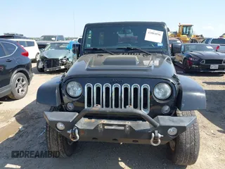 2015 Jeep Wrangler Unlimited Sahara with VIN 1C4BJWEG0FL717536, listed as a IAAI auction lot 42004096 with 90,802 mi miles and . Bid and sale history available at DreamBid. Image 12.
