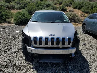 2015 Jeep Cherokee Sport with VIN 1C4PJMAB9FW545249, listed as a Copart auction lot 57528075 with 158,074 mi miles and Salvage title. Bid and sale history available at DreamBid. Image 5.