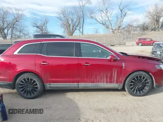 2014 Lincoln MKT EcoBoost with VIN 2LMHJ5ATXEBL58430, listed as a IAAI auction lot 41657571 with 58,502 mi miles and . Bid and sale history available at DreamBid. Image 13.