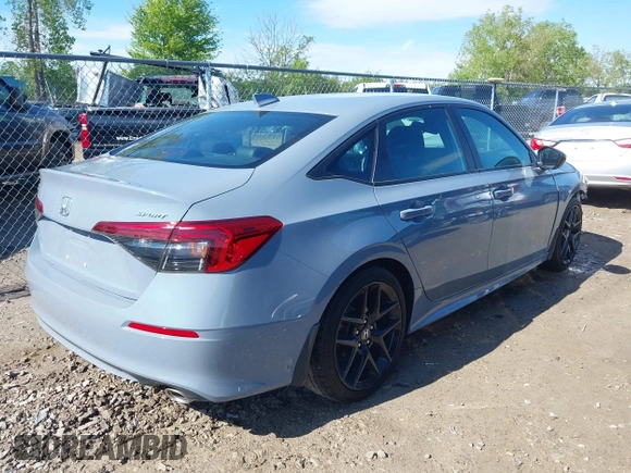 2023 Honda Civic Sport with VIN 2HGFE2F55PH517831, listed as a IAAI auction lot 42255985 with 31,554 mi miles and . Bid and sale history available at DreamBid. Image 4.