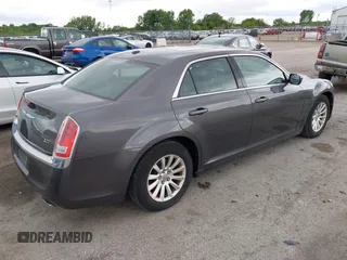 2013 Chrysler 300 with VIN 2C3CCAAG9DH707447, listed as a IAAI auction lot 42292077 with 171,329 mi miles and . Bid and sale history available at DreamBid. Image 4.