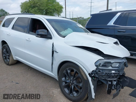 2023 Dodge Durango R/T Plus with VIN 1C4SDHCT7PC686970, listed as a IAAI auction lot 42156304 with 14,592 mi miles and . Bid and sale history available at DreamBid. Image 1.