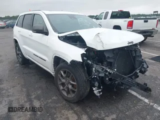 2021 Jeep Grand Cherokee 80th Anniversary with VIN 1C4RJFBG2MC568028, listed as a IAAI auction lot 42381104 with 51,027 mi miles and . Bid and sale history available at DreamBid. Image 1.