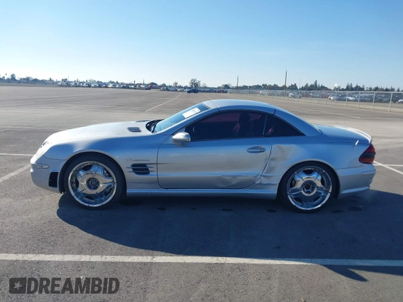 2004 Mercedes-Benz SL 55/63 AMG z VIN WDBSK74F14F076497, wystawiony jako IAAI lot #41285216 z przebiegiem 146 160 mil mil oraz . Historia ofert i sprzedaży dostępna na DreamBid. Obrazek 14.