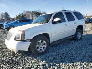 2012 GMC Yukon SLT with VIN 1GKS1CE03CR100582, listed as a Copart auction lot 44990745 with 146,089 mi miles and Salvage Title. Bid and sale history available at carsss.com. Image 1.