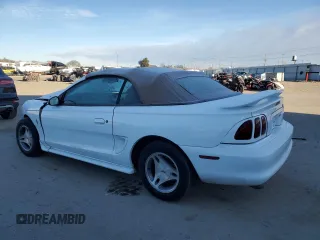 1998 Ford Mustang with VIN 1FAFP4440WF160806, listed as a Copart auction lot 42334235 with 82,105 mi miles and Salvage Title. Bid and sale history available at carsss.com. Image 2.