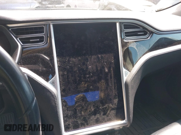 2015 Tesla Model S 85D with VIN 5YJSA1H2XFF084145, listed as a IAAI auction lot 42101755 with 105,660 mi miles. Bid and sale history available at carsss.com. Image 18.