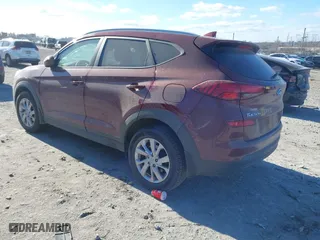 2020 Hyundai Tucson Value with VIN KM8J3CA42LU149811, listed as a IAAI auction lot 41642255 with 60,936 mi miles. Bid and sale history available at carsss.com. Image 3.