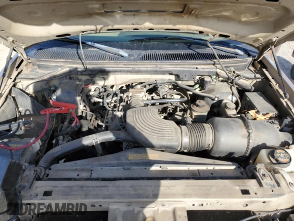 1999 Ford F-150 XL с VIN 1FTRF17L2XKA36749, выставлен на аукционе Copart как лот 84671444 с пробегом 148 338 миль миль и Списание • Salvage title. История ставок и продаж доступна на DreamBid. Изображение 11.