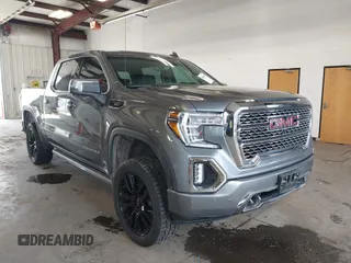 2021 GMC Sierra 1500 Denali z VIN 1GTU9FET4MZ271769, wystawiony jako IAAI lot #41846409 z przebiegiem 47 770 mil mil oraz . Historia ofert i sprzedaży dostępna na DreamBid. Obrazek 1.