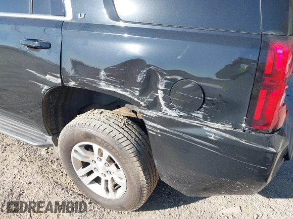 2016 Chevrolet Tahoe LT with VIN 1GNSKBKCXGR393105, listed as a IAAI auction lot 42039456 with 94,417 mi miles and . Bid and sale history available at DreamBid. Image 19.