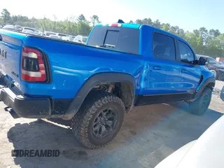 2021 Ram 1500 TRX z VIN 1C6SRFU91MN900450, wystawiony jako IAAI lot #42102724 z przebiegiem 80 071 mil mil oraz . Historia ofert i sprzedaży dostępna na DreamBid. Obrazek 12.