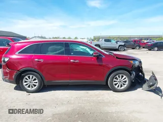 2019 Kia Sorento LX z VIN 5XYPG4A50KG470876, wystawiony jako IAAI lot #42156680 z przebiegiem 133 683 mil mil oraz . Historia ofert i sprzedaży dostępna na DreamBid. Obrazek 13.