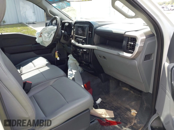 2023 Ford F-150 XL with VIN 1FTMF1CP7PKF84555, listed as a IAAI auction lot 42197597 with 12,216 mi miles and . Bid and sale history available at DreamBid. Image 5.