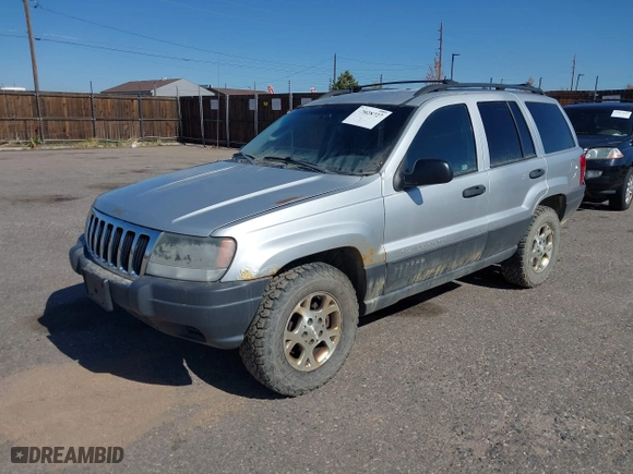 2003 Jeep Grand Cherokee Laredo with VIN 1J4GW48S03C567770, listed as a IAAI auction lot 42028727 with 245,728 mi miles. Bid and sale history available at carsss.com. Image 2.