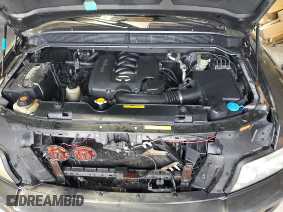2006 Infiniti QX56 z VIN 5N3AA08A96N800292, wystawiony jako Copart lot #42050855 z przebiegiem 305 926 mil mil oraz Czysty tytuł • Clean title. Historia ofert i sprzedaży dostępna na DreamBid. Obrazek 12.