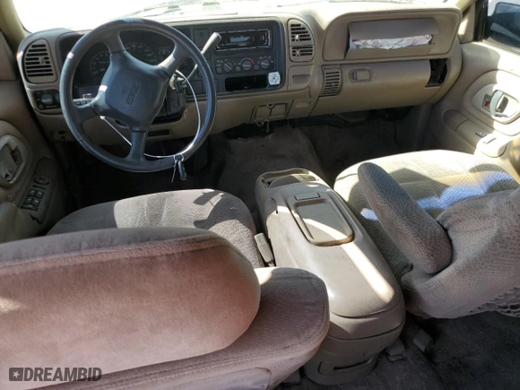 1998 GMC Suburban with VIN 1GKEC16R0WJ712847, listed as a Copart auction lot 68557804 with NaN miles and Salvage Title. Bid and sale history available at carsss.com. Image 8.