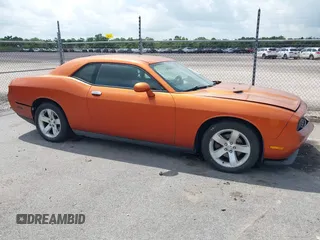 2011 Dodge Challenger z VIN 2B3CJ4DG7BH581585, wystawiony jako IAAI lot #42358543 z przebiegiem 247 380 mil mil oraz . Historia ofert i sprzedaży dostępna na DreamBid. Obrazek 13.